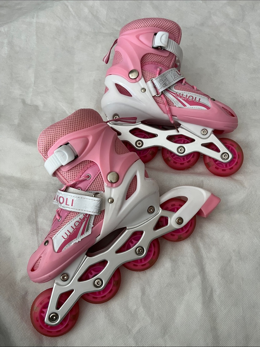 ULIOli-brand inline skates adjustable pink design for children light-up wheels.